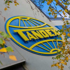 The tandex logo as found on the front of the current building