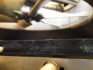 Cooling tower drift eliminators installed above the fill pack inside a tower, designed to capture water droplets and reduce drift loss to the surrounding environment.
