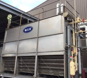 WXR cooling tower installed at an industrial facility providing heat rejection for the site’s cooling water system.
